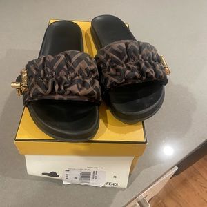 Black and Brown Fendi slides, size 40, come a  in th box and dust bag